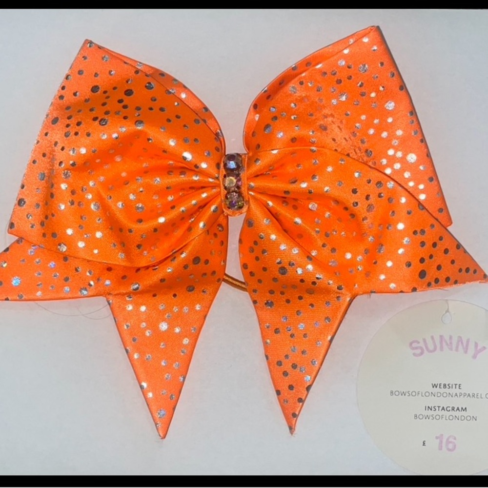 Never been worn “Sunny” Bows of London bow